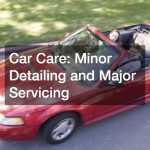 couple in a red convertible